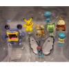 imagePokmon Battle Figure 8 Pack  Features 2Inch Pikachu Eevee Appletun Growlithe Mimikyu Togepi 3Inch Raichu amp Hawlucha  Authentic Details